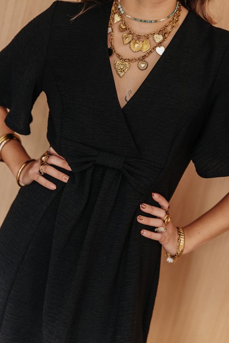 Femme avec une robe.