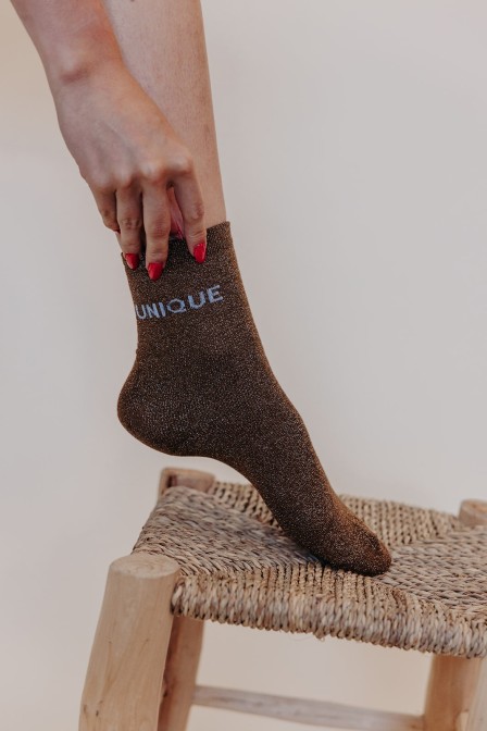 Zoom sur les chaussettes posées. Zoom sur les chaussettes posées.