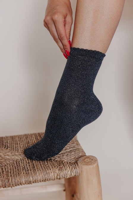 Chaussettes à paillettes posées.